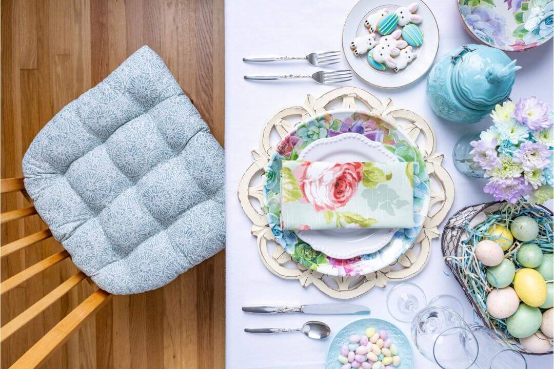 dining room decorated for easter in spring time colors with pastel dining chair pad and table linens