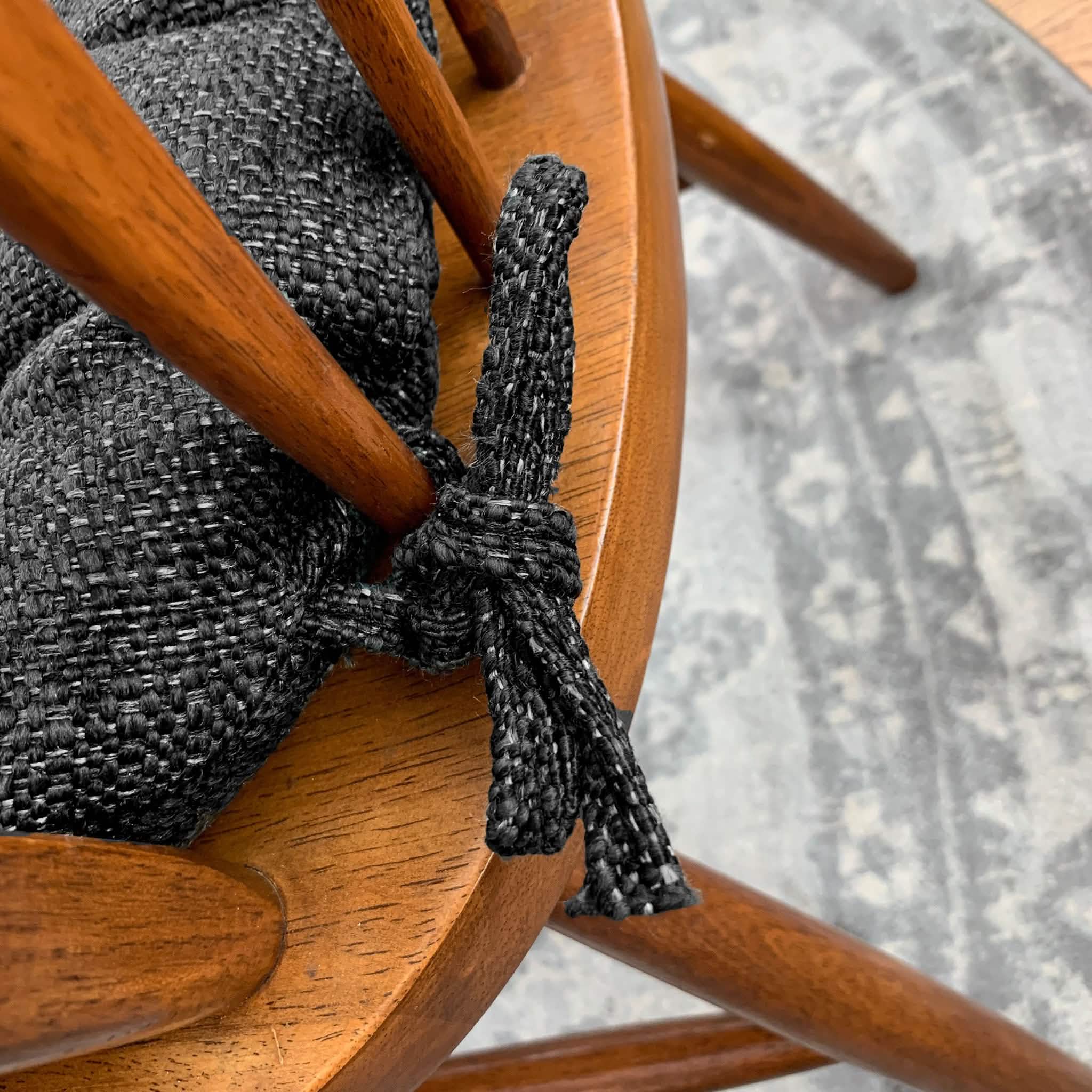 Detailed view of Brisbane charcoal black dining chair pad edge and construction
