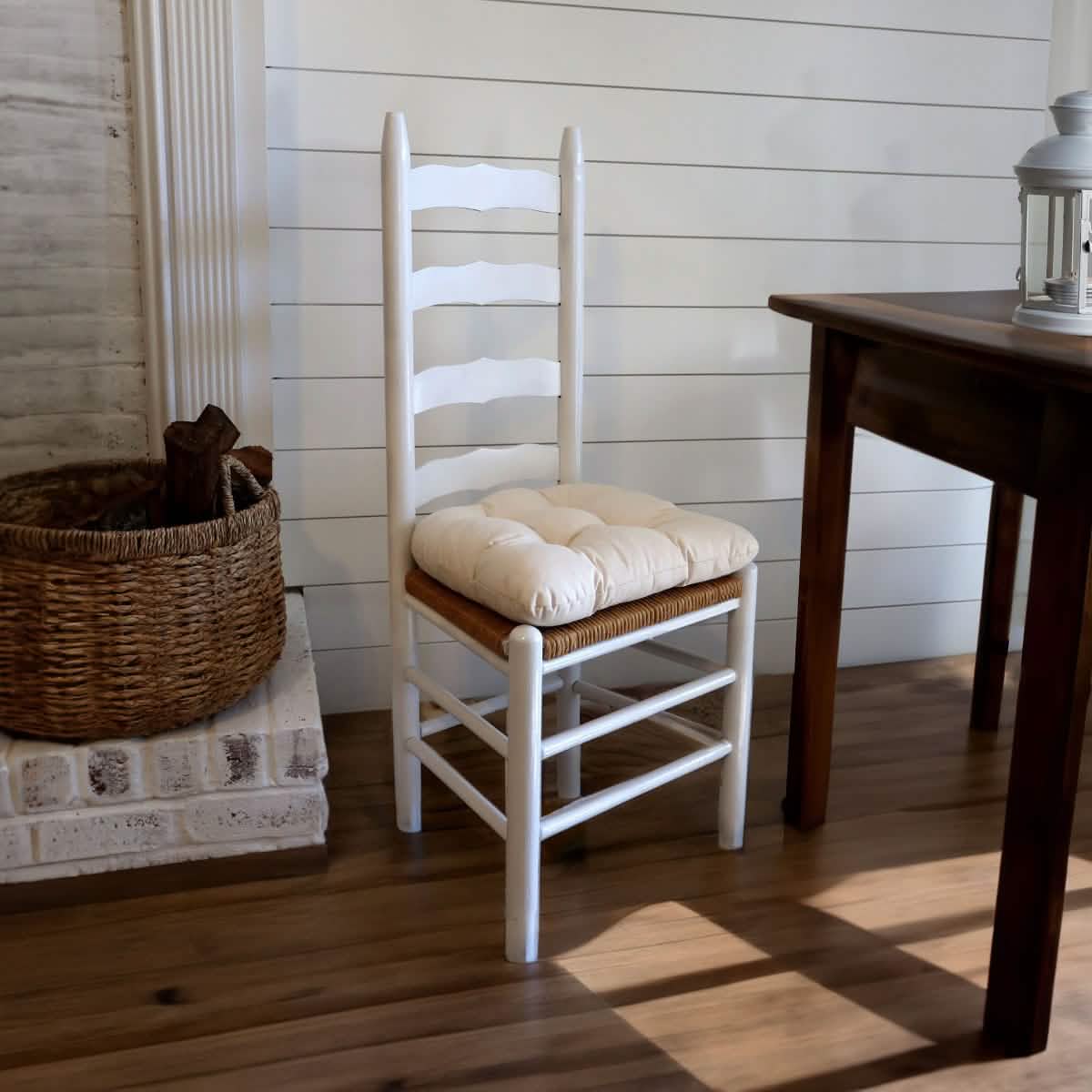 extra thick natural latex chair pad on ladderback dining chair with cane seat in farmhouse dining room