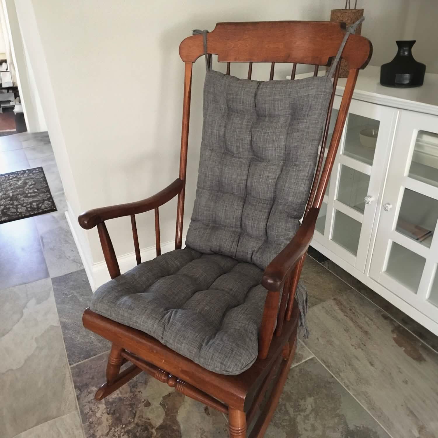 grey rocking chair cushions on a wooden glider