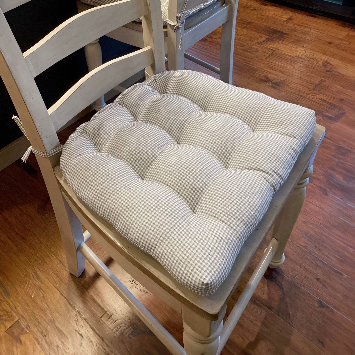 Madrid grey gingham dining chair cushions styled in modern dining room setting