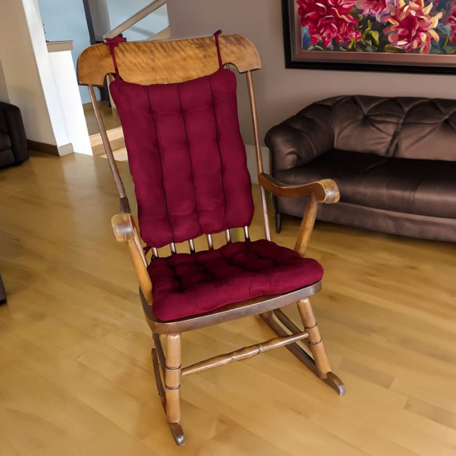 wine red rocking chair cushions on a wood rocker in a contemporary decor living room