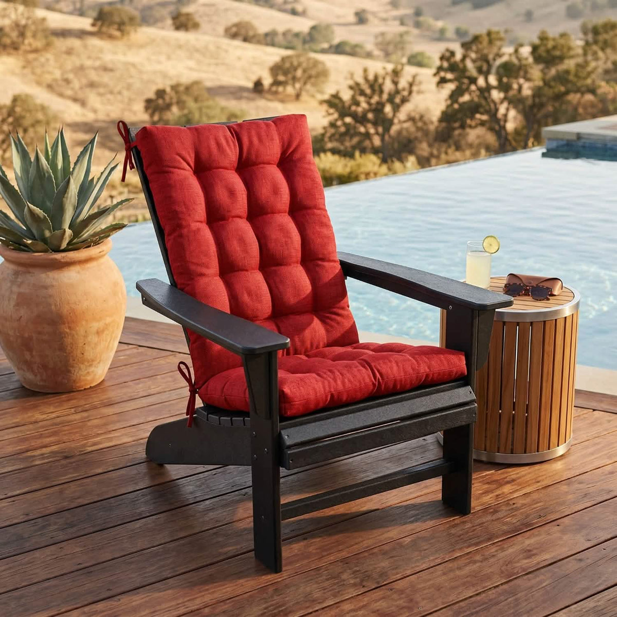 red adirondack chair cushion set on polywood adirondack chair on the deck by the pool