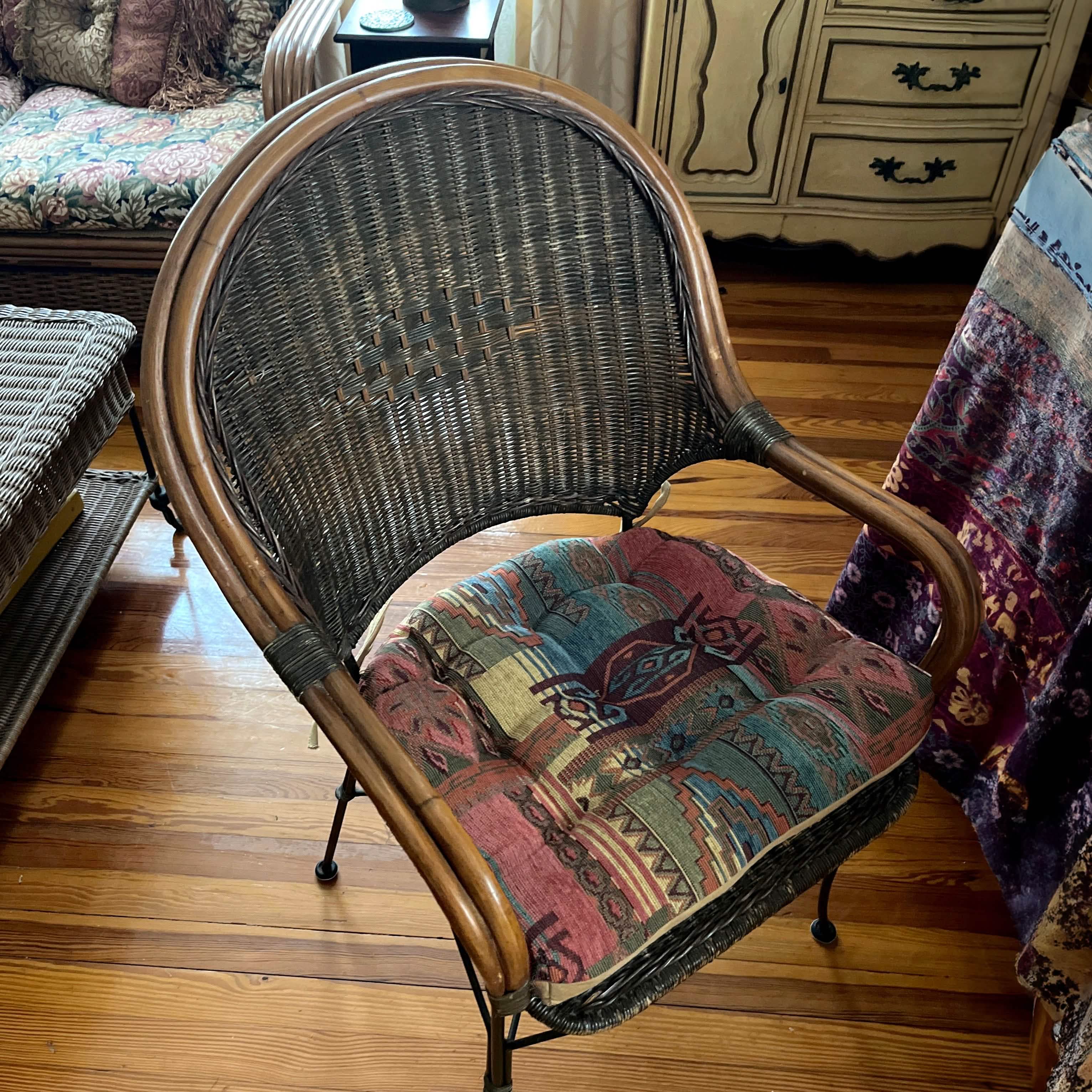 Southwest Sedona dining chair cushion displayed on wicker chair showing versatile styling options for different furniture types