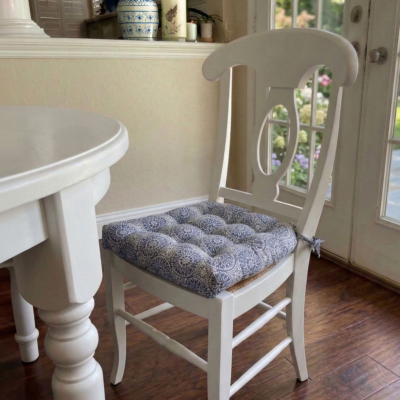 navy blue dining room chair cushions on napoleon chairs in transitional dining room