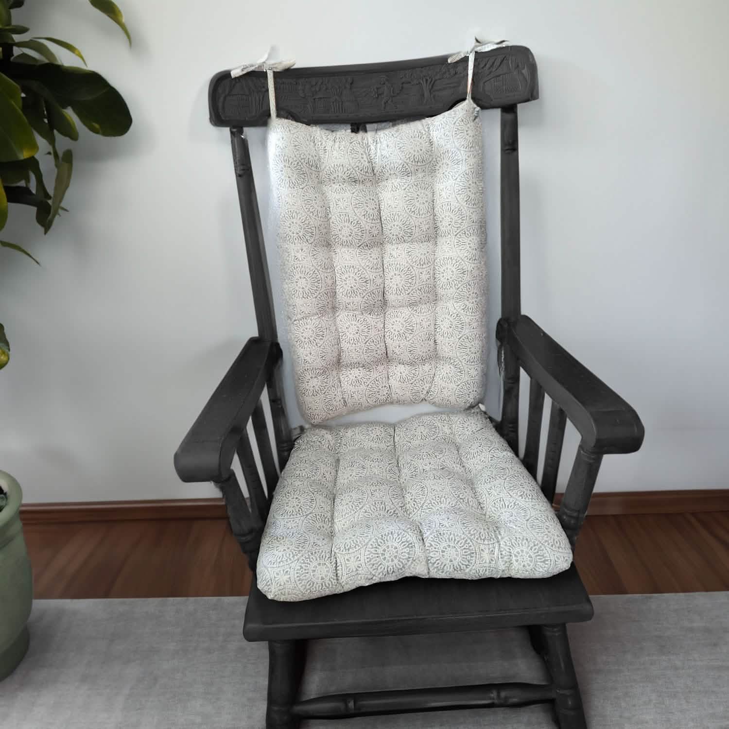 gray rocking chair cushions on a black rocker