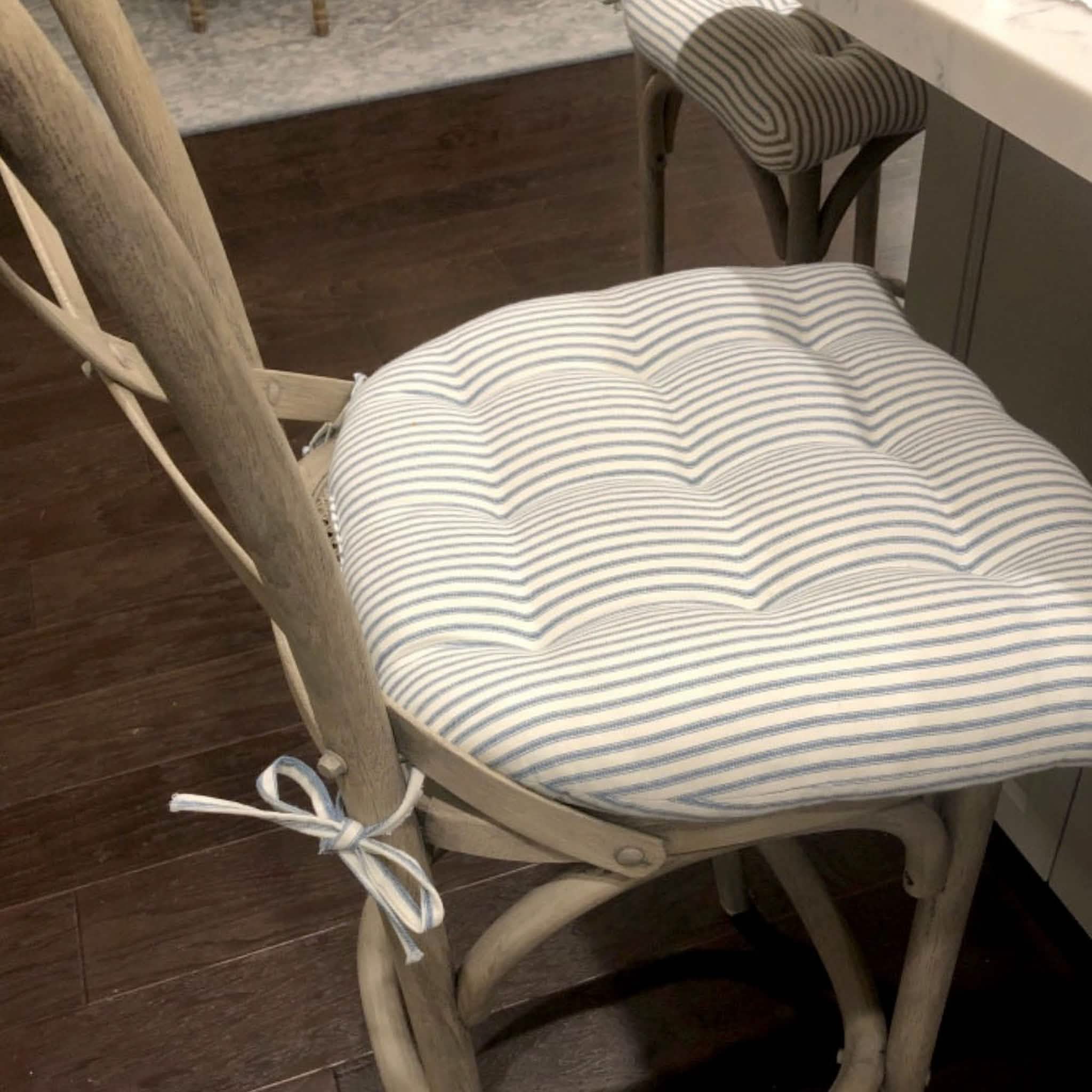 Close-up detail of Ticking Stripe Berlin Blue chair pad showing cotton fabric texture and blue stripe pattern