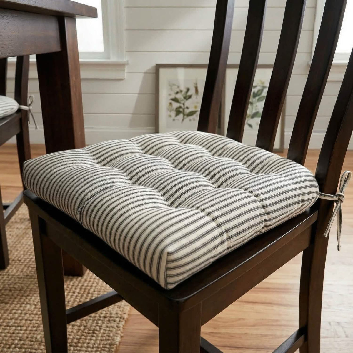 black striped dining chair cushion on a wooden dining room chair