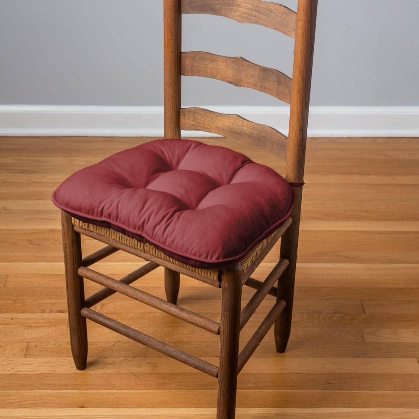dark red extra thick chair pad on brown dining chair