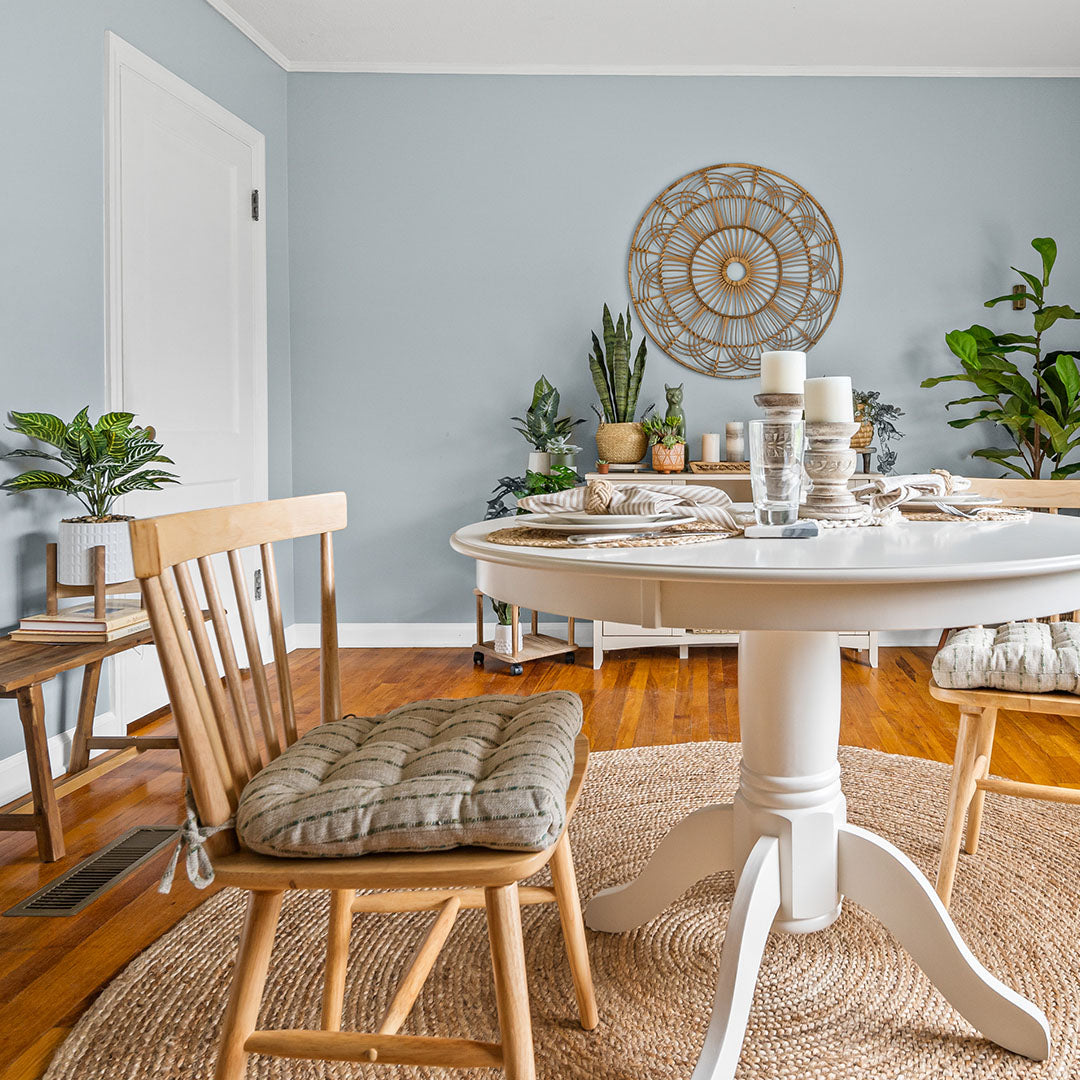 avante chair pads with green stripes with natural background on windsor chairs in boho dining room