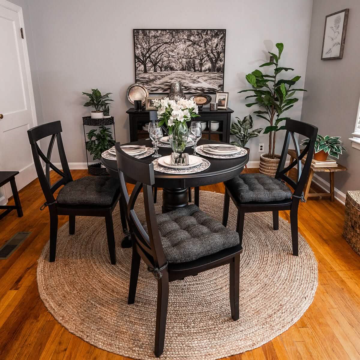 charcoal black dining chair pads on black crossback dining chairs in contemporary dining room