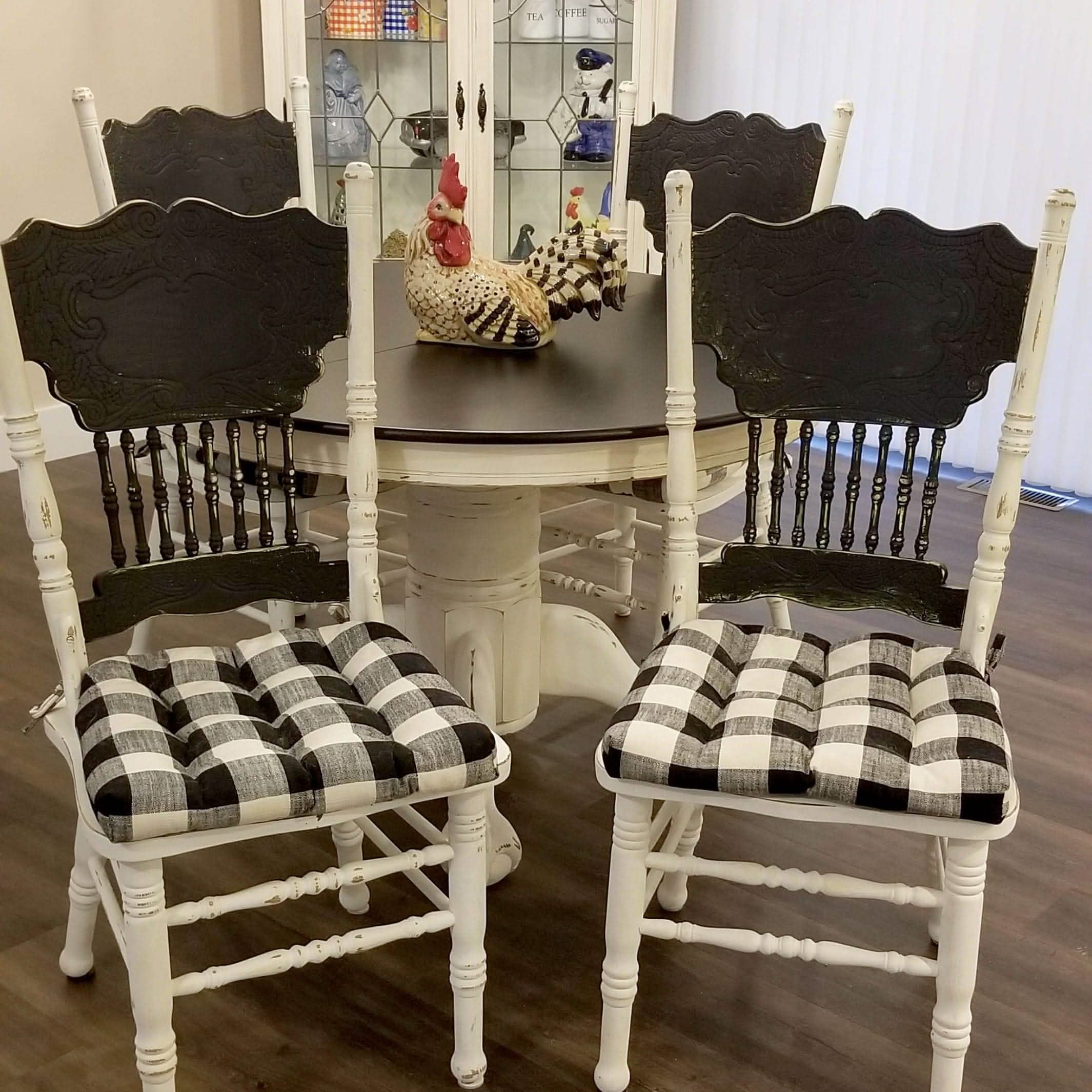 Buffalo Plaid Dining Chair Pads on Black and White Chalk Painted Chairs in Farmhouse Kitchen