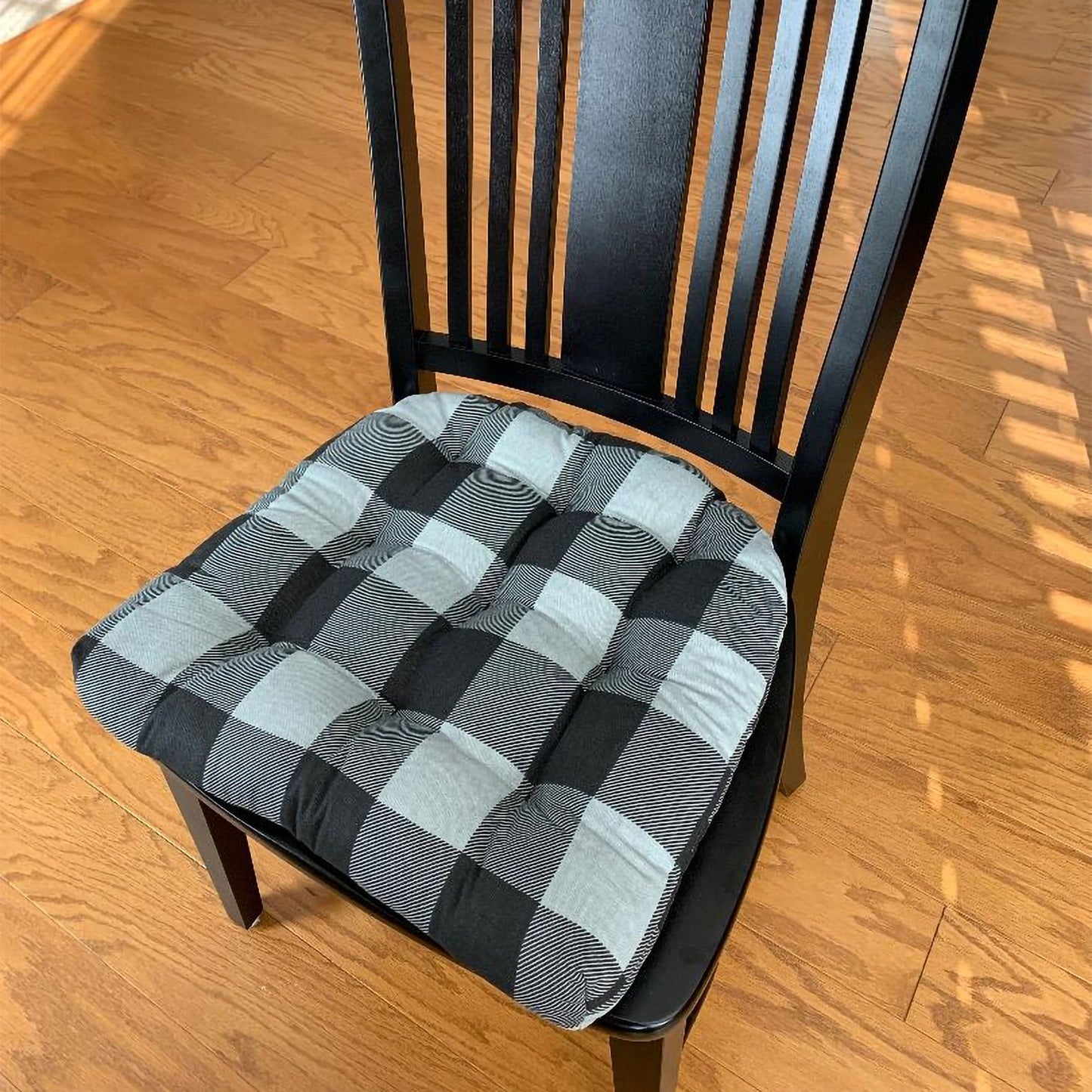 Barnett Home Decor Buffalo Black and Grey Dining Chair cushions on black dining room chair