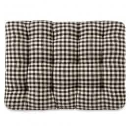 Black and cream checkered pet bed with deep tufted cushion