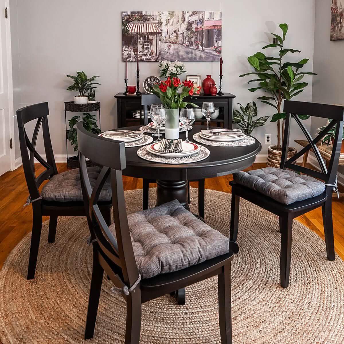 gray mid-century dining chair pads on black dining chairs in paris cafe theme dining room with red decor accents