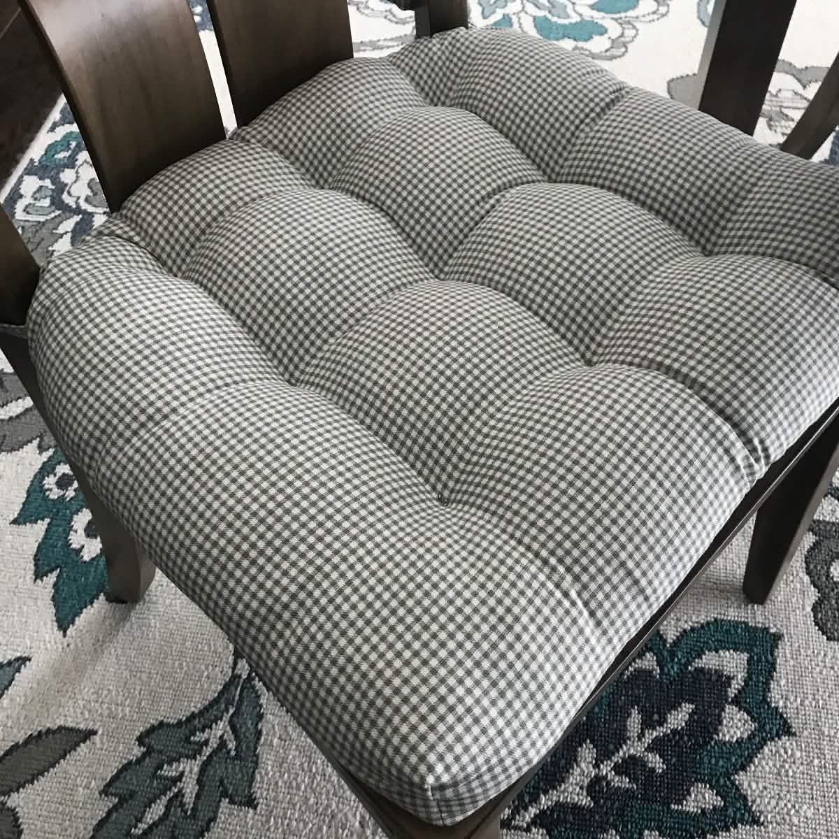 Close-up view of Madrid grey gingham dining chair cushion showing fabric texture and pattern detail