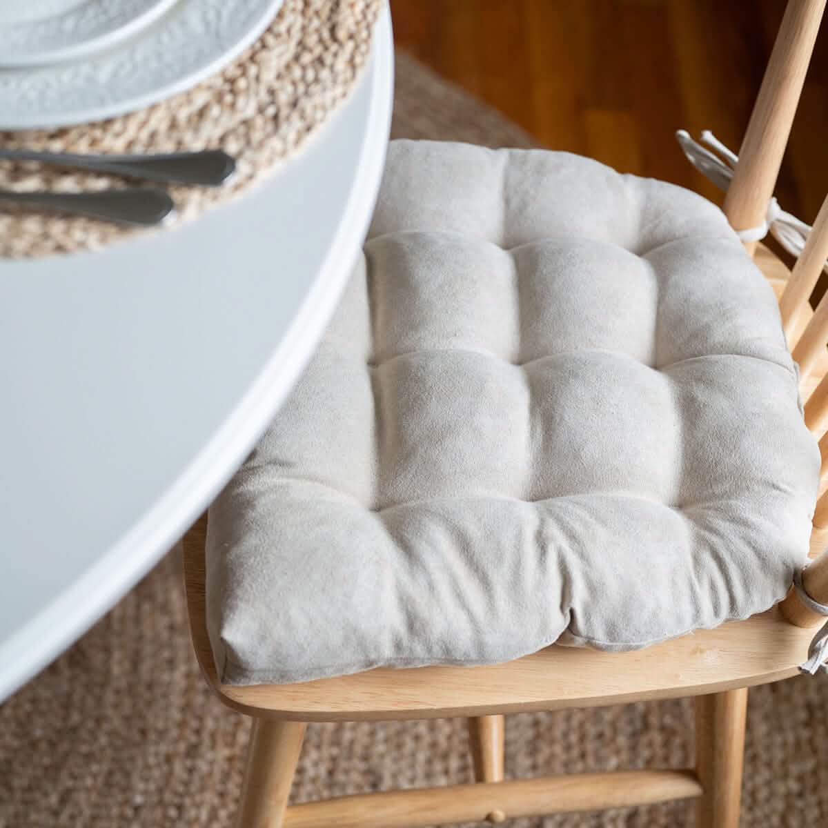 closeup detail view of vegan suede dining room chair cushion