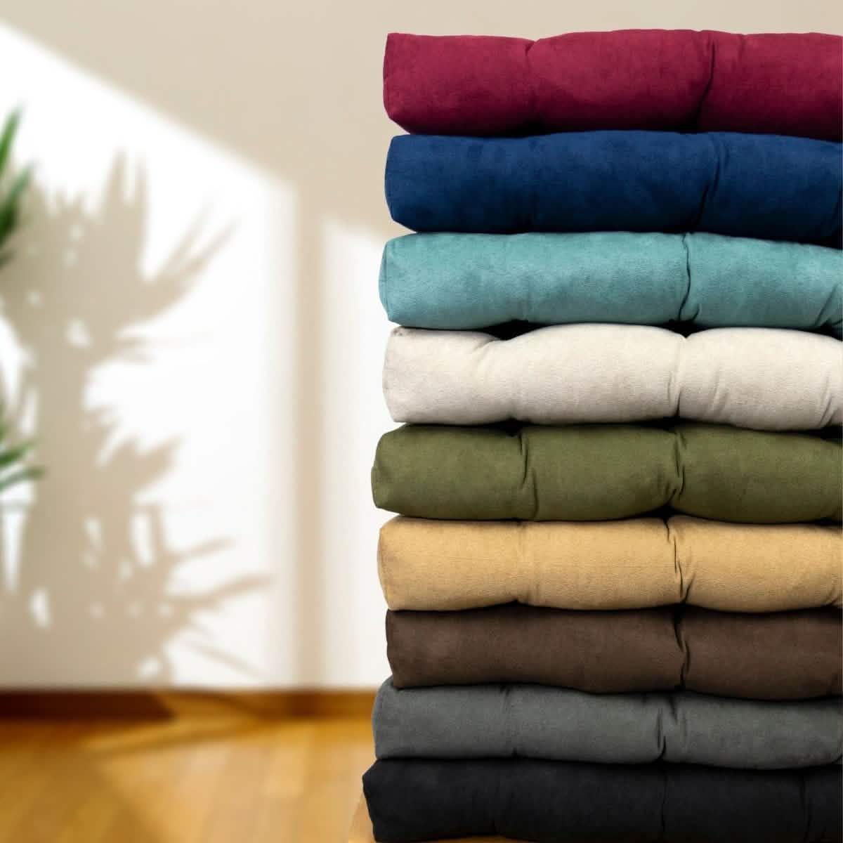 stack of microsuede dining room chair cushions showing color options wine royal aqua natural green buff brown gray and black