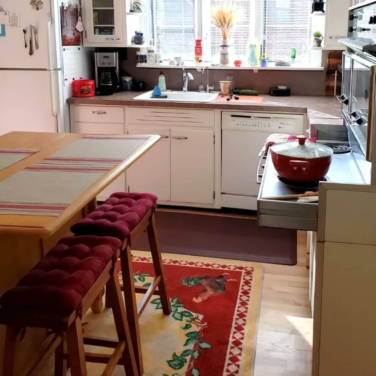 red saddle seat stool cushions in farmhouse kitchen