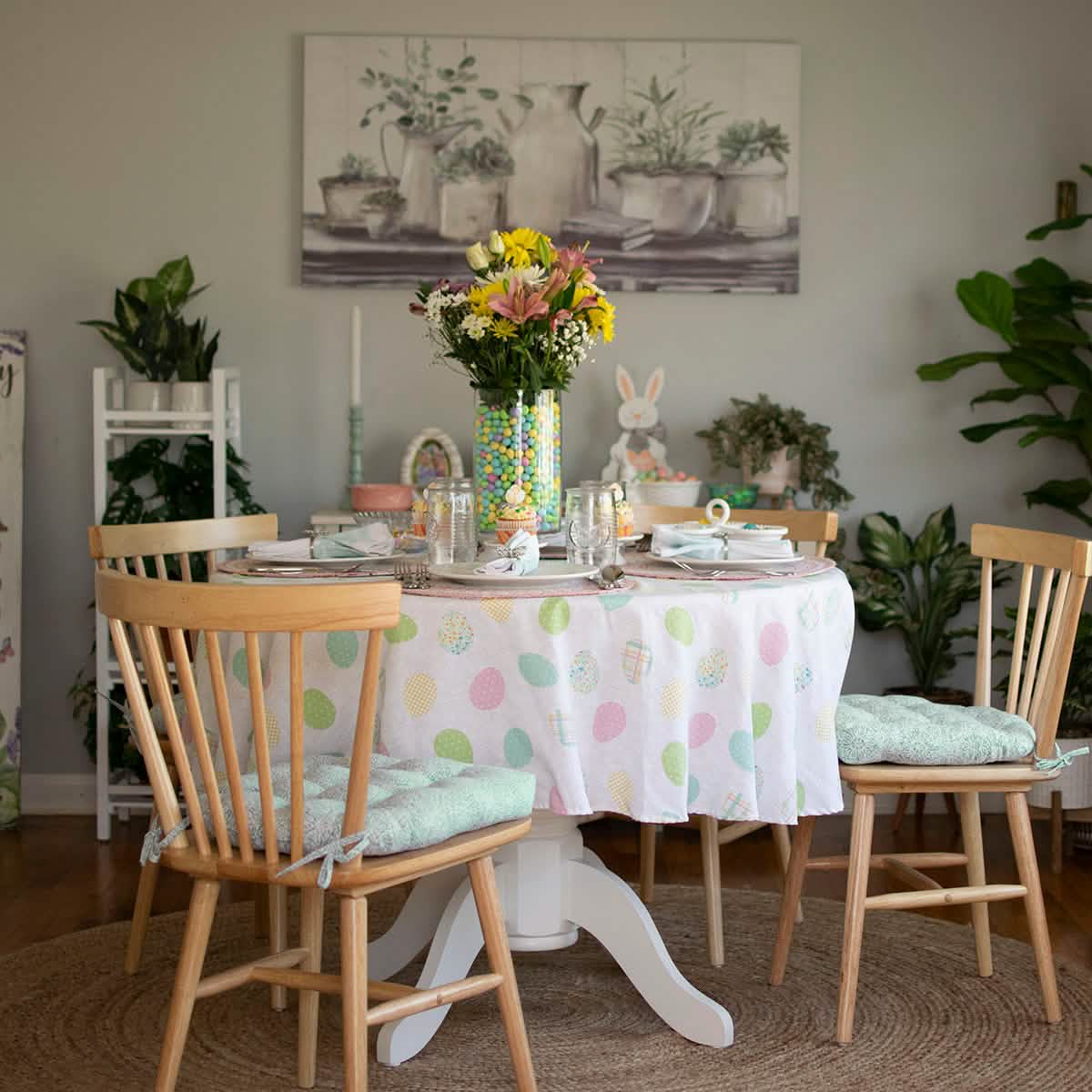 Lifestyle image of Tibet Spa dining chair cushion in aqua and white, perfect for contemporary and boho home decor styles