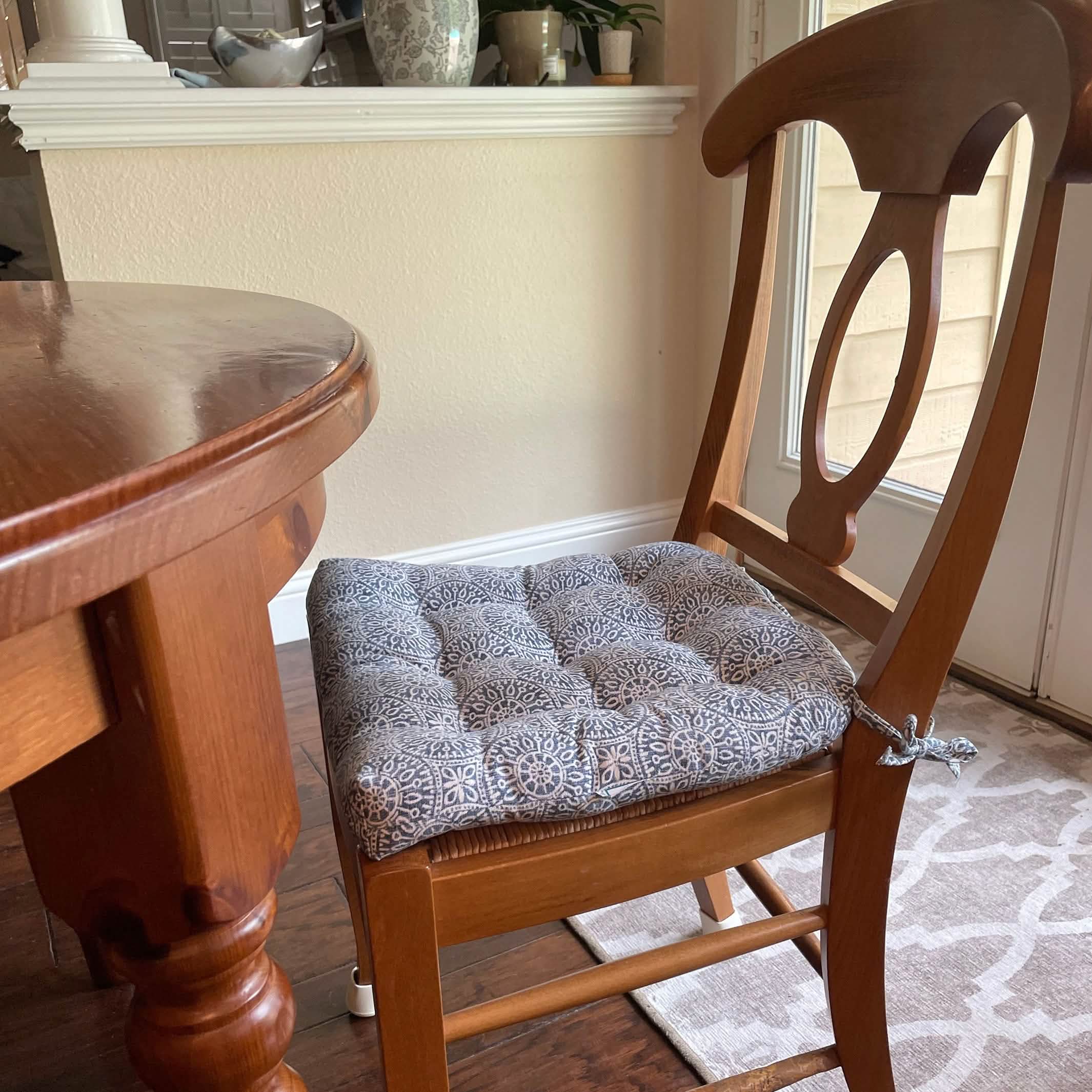 navy blue dining room chair cushions on napoleon chairs in transitional dining room