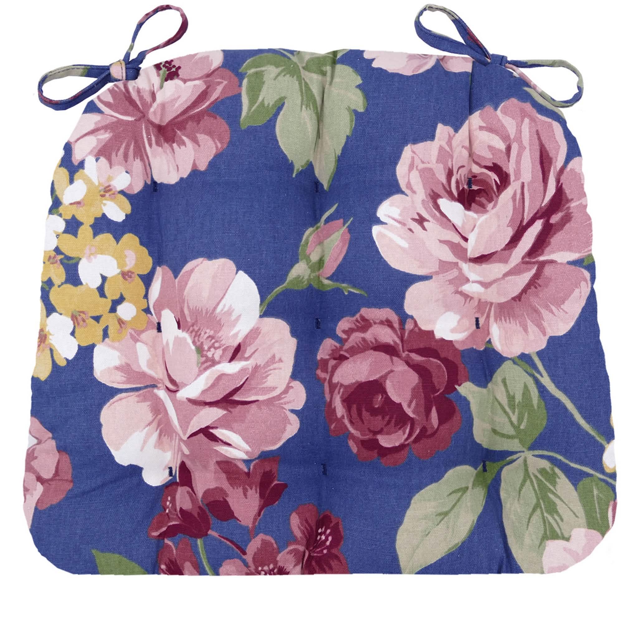 Close-up of blue floral pattern on dining chair cushion