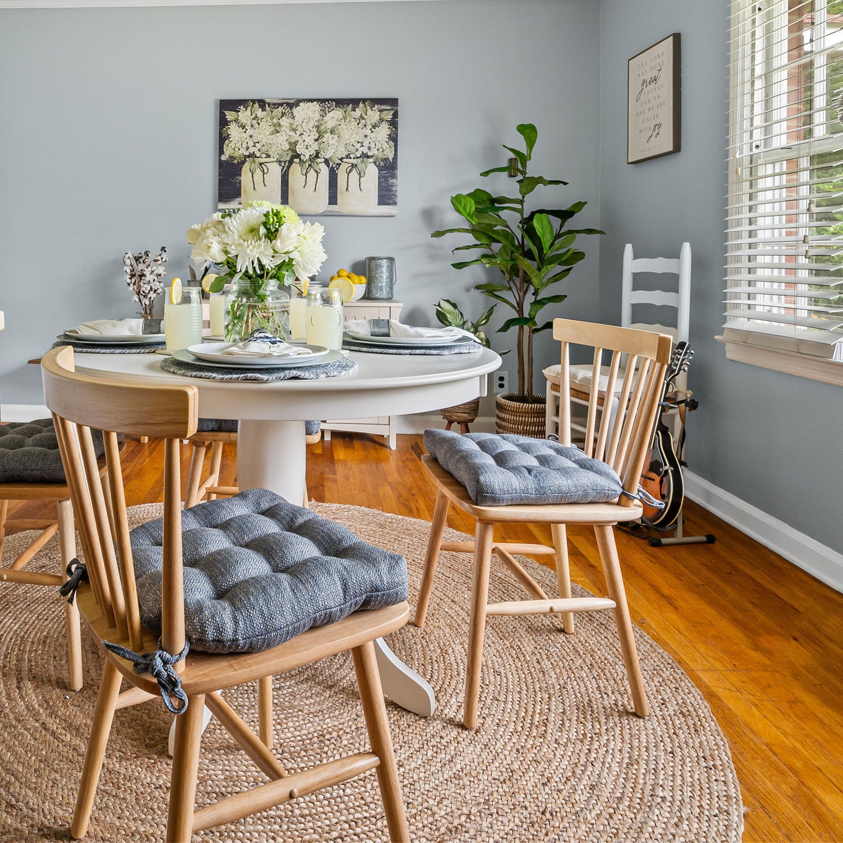 farmhouse dining chair cushions in slate blue in country kitchen with mason jars and lemons