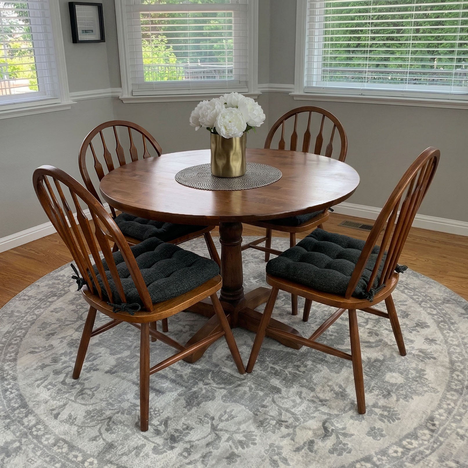 charcoal black dining chair cushions on windsor dining chairs in a breakfast nook