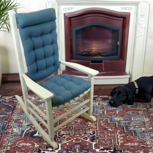 federal blue rocking chair cushions on a white rocker in a traditional living room by the fireplace
