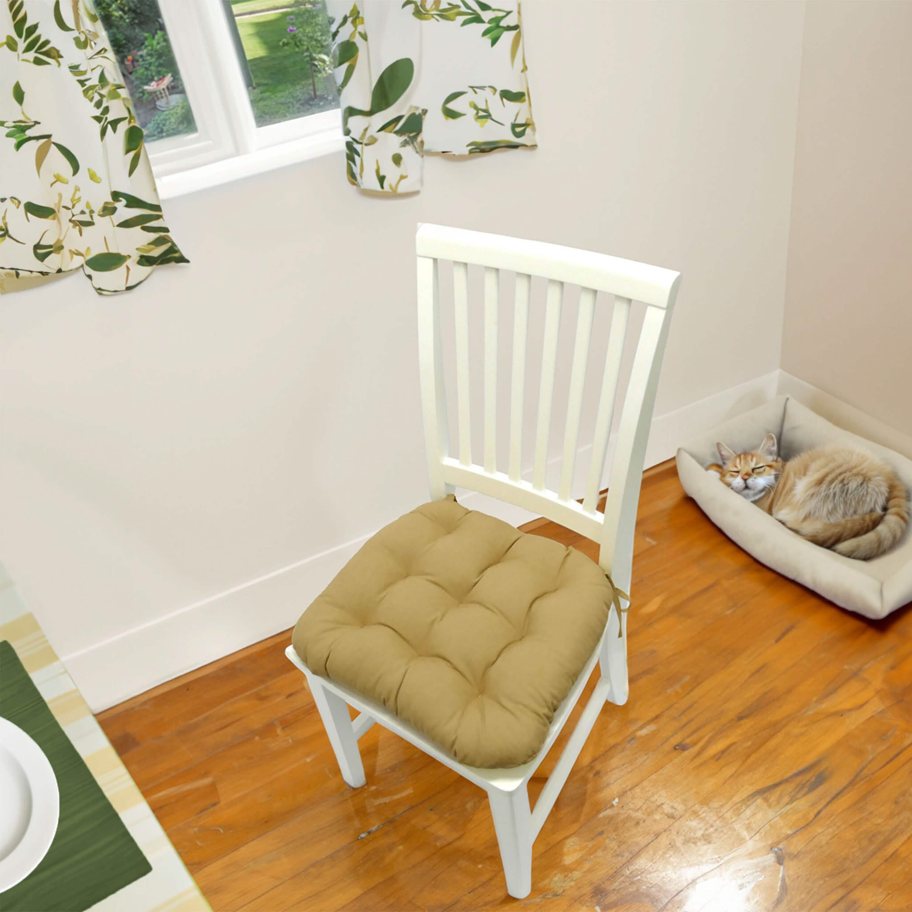 Close-up view of tan cotton duck dining chair cushion showing fabric texture and quality