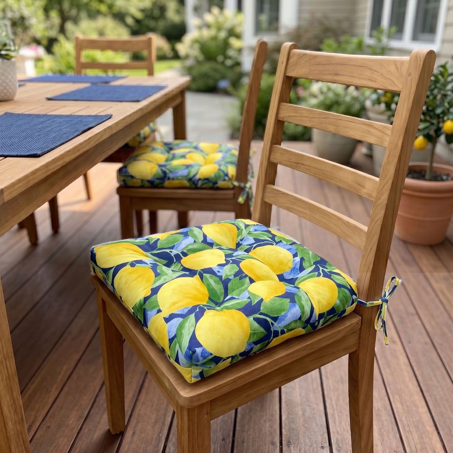 lemons dining chair cushion on an outdoor dining chair on the deck