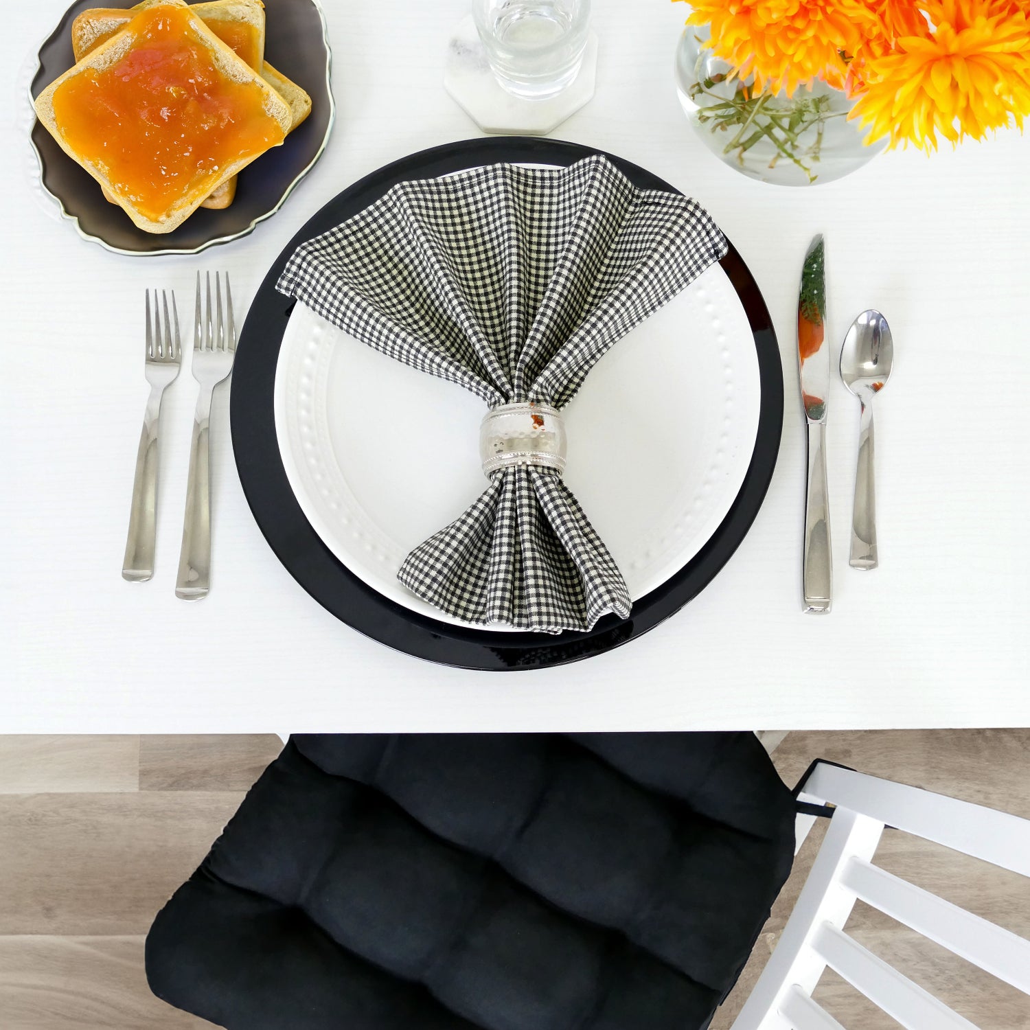 black gingham table napkin and place setting
