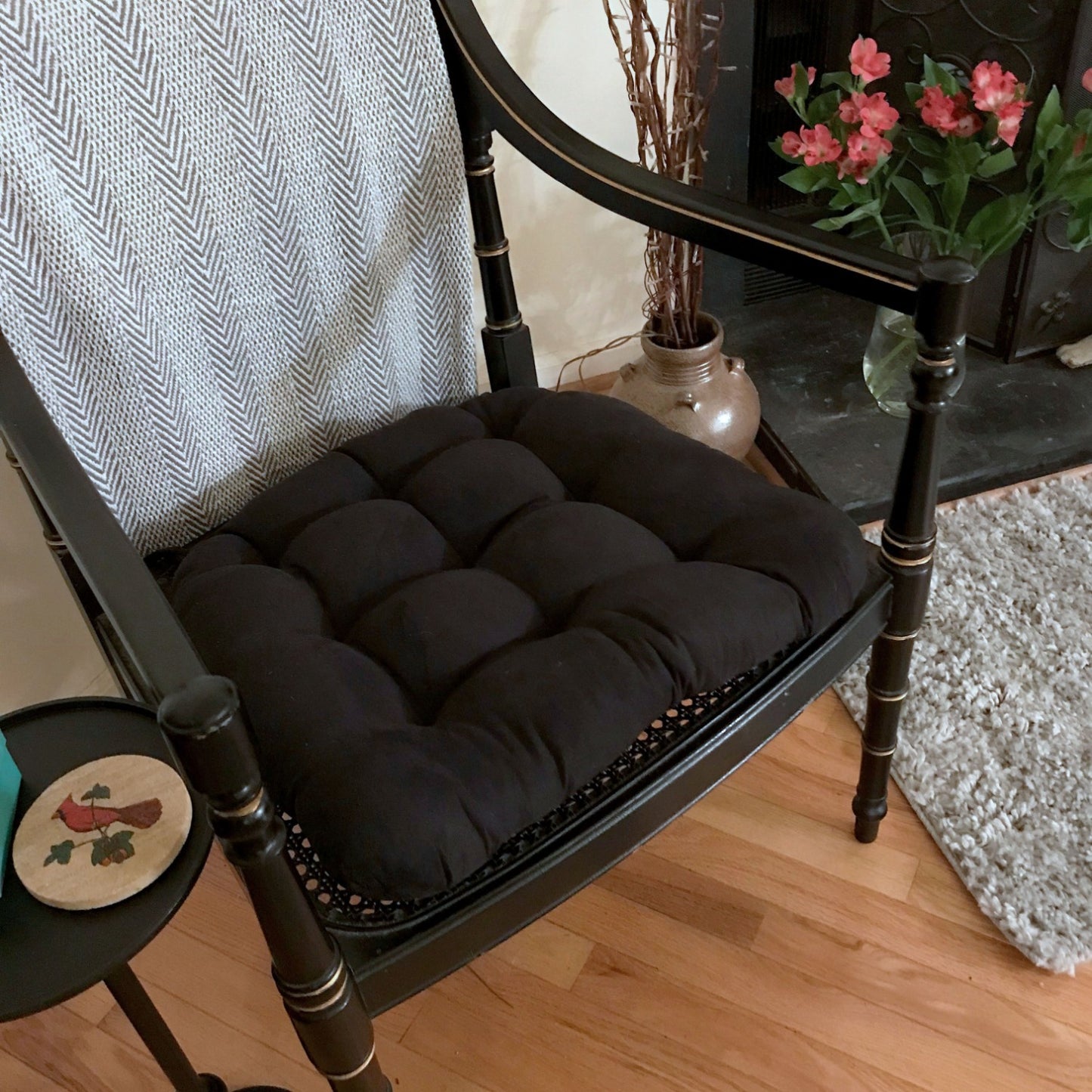 black wicker chair cushions on a cane seat arm chair in the federal style