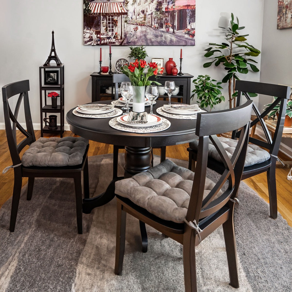 grey dining chair cushions on black chairs in dining room with paris bistro theme in gray black and red