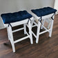 royal blue saddle stool cushions made of faux suede micro fiber with white saddle stools at kitchen bar