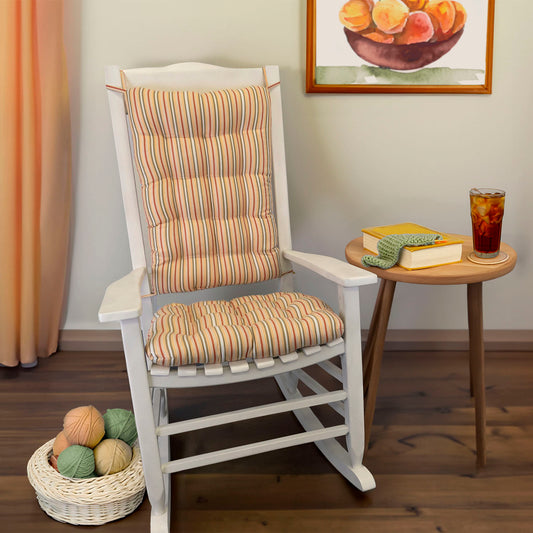 yellow striped rocking chair cushions with apricot and green stripes on a white rocker