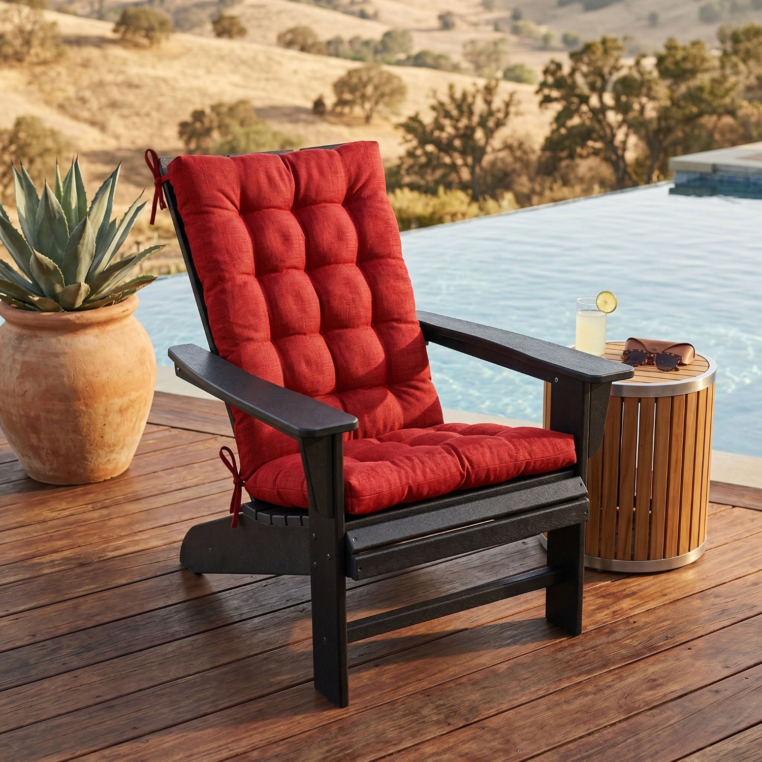 red adirondack chair cushion set on polywood adirondack chair on the deck by the pool