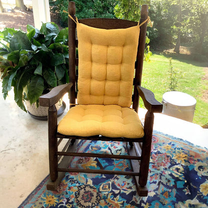 yellow outdoor rocker cushions on the porch