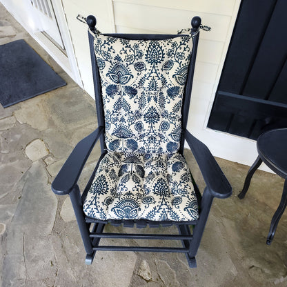 arts and crafts style rocking chair cushions in navy blue on cobalt rocking chair outside colonial home with flagstone pavers