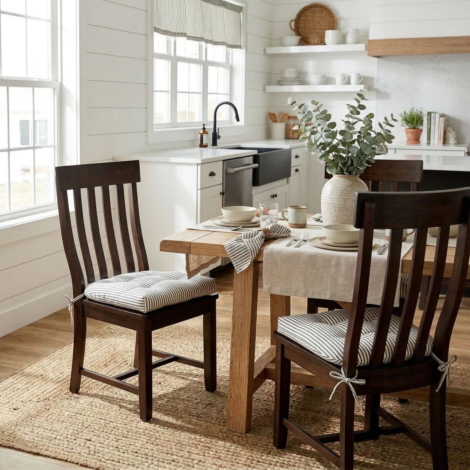ticking stripe kitchen chair cushions in a farmhouse dining nook