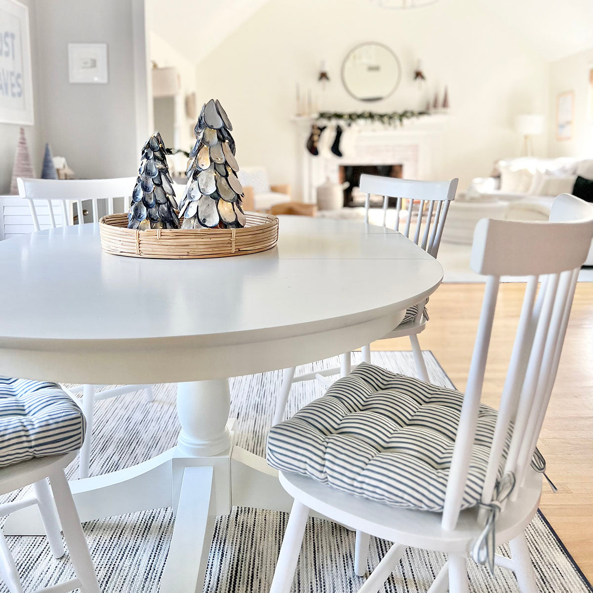 ticking stripe dining room chair cushions at white dining table