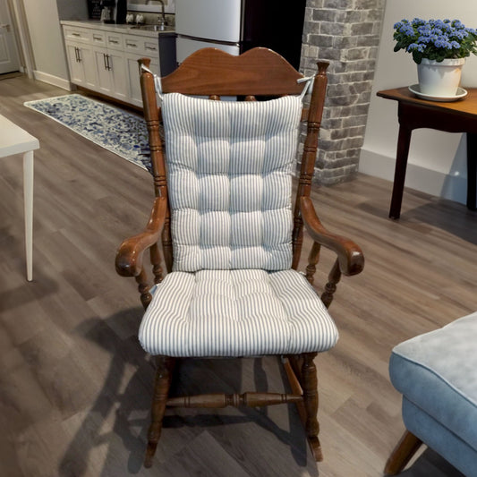 blue stripe rocker cushions on a wooden rocking chair with colonial blue accents