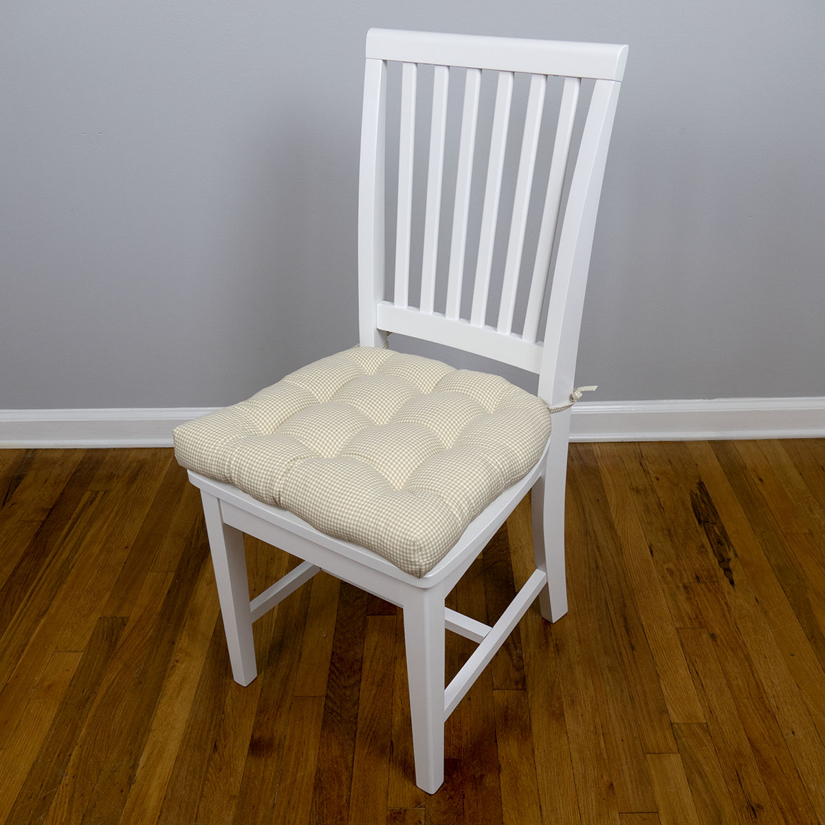 natural checked chair pads on white mission style dining chair