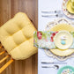 Extra thick welted yellow chair pad with Easter place setting