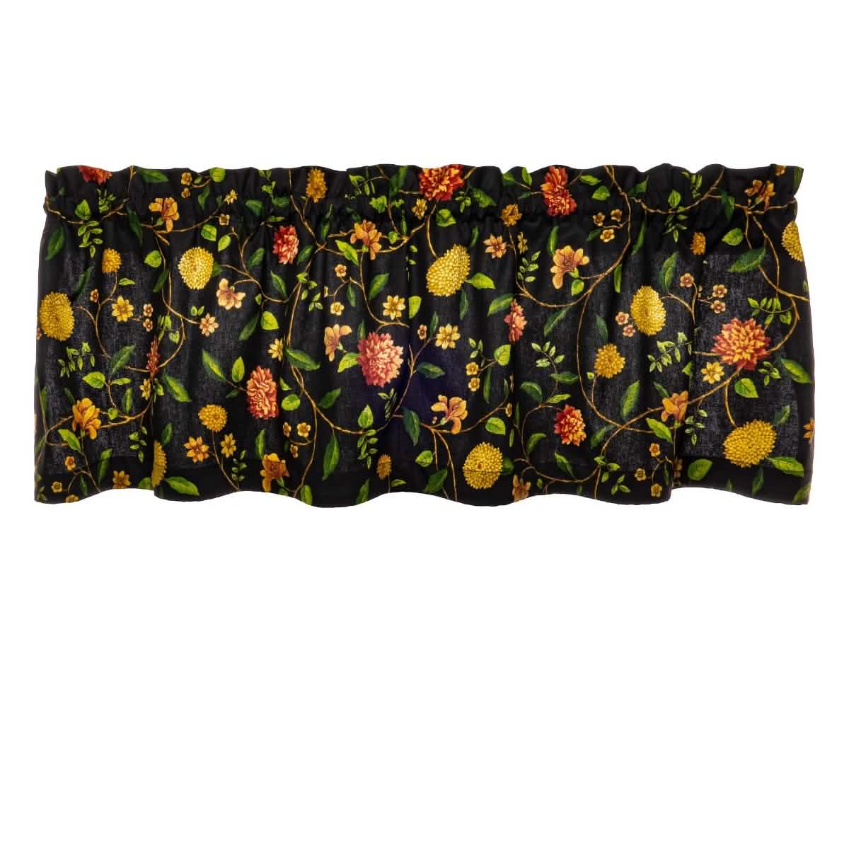 Close-up detail of Nassau Vine black cotton fabric showing earthy blossoming vine print