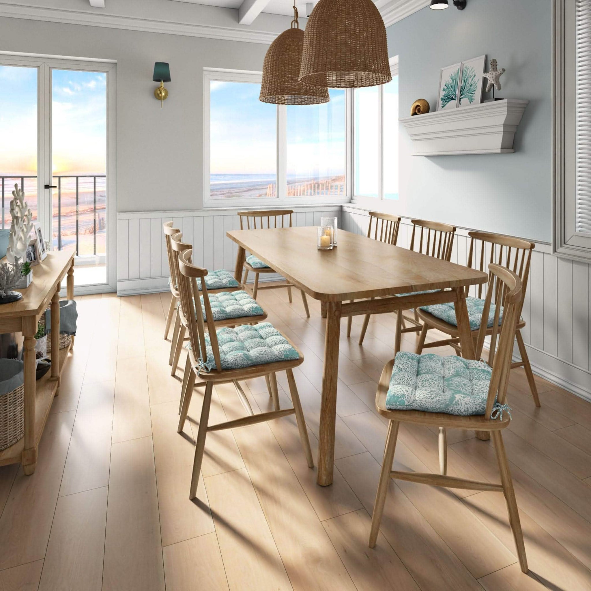 coastal dining chair cushions with coral pattern on aqua chair pad in beach house kitchen