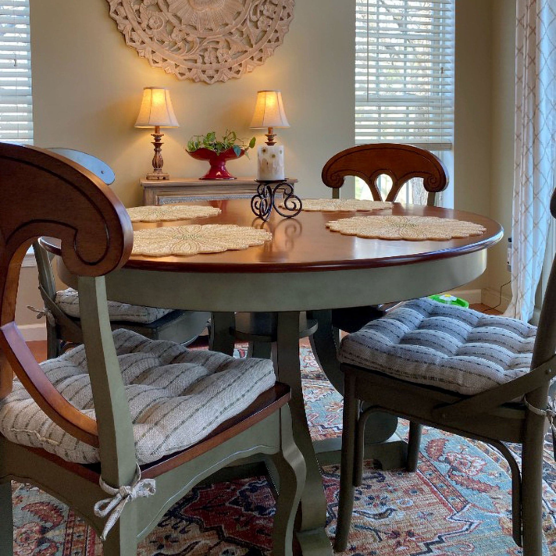green striped dining room chair cushions on napoleon chairs in transitional dining room