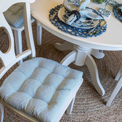 navy blue and white cotton dining room chair cushions closeup detail view with matching reusable cloth napkins