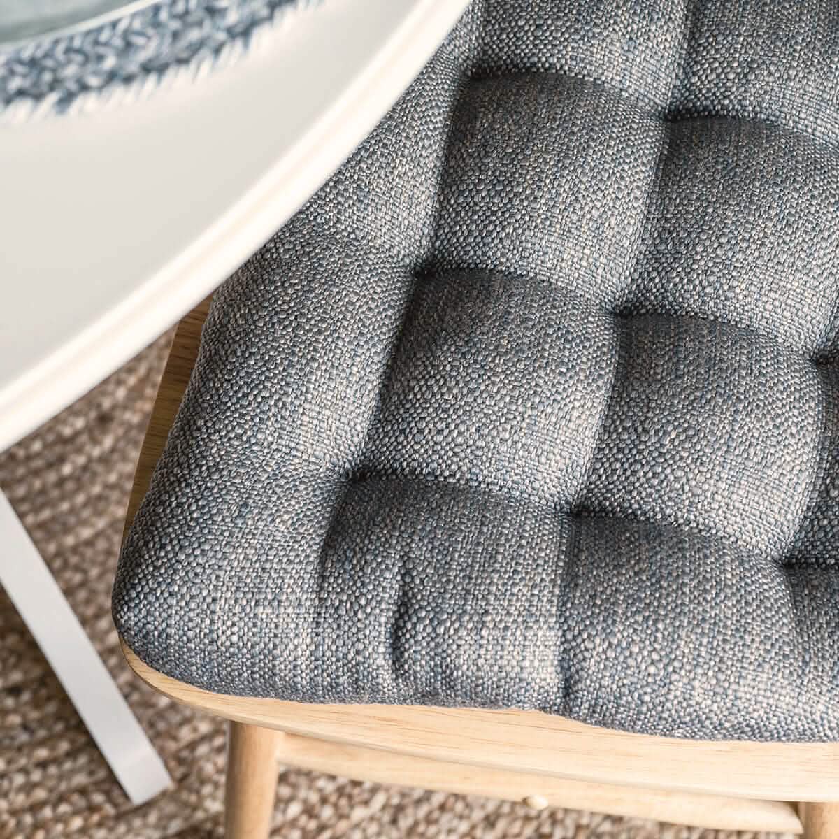closeup of blue gray chair pad in country kitchen