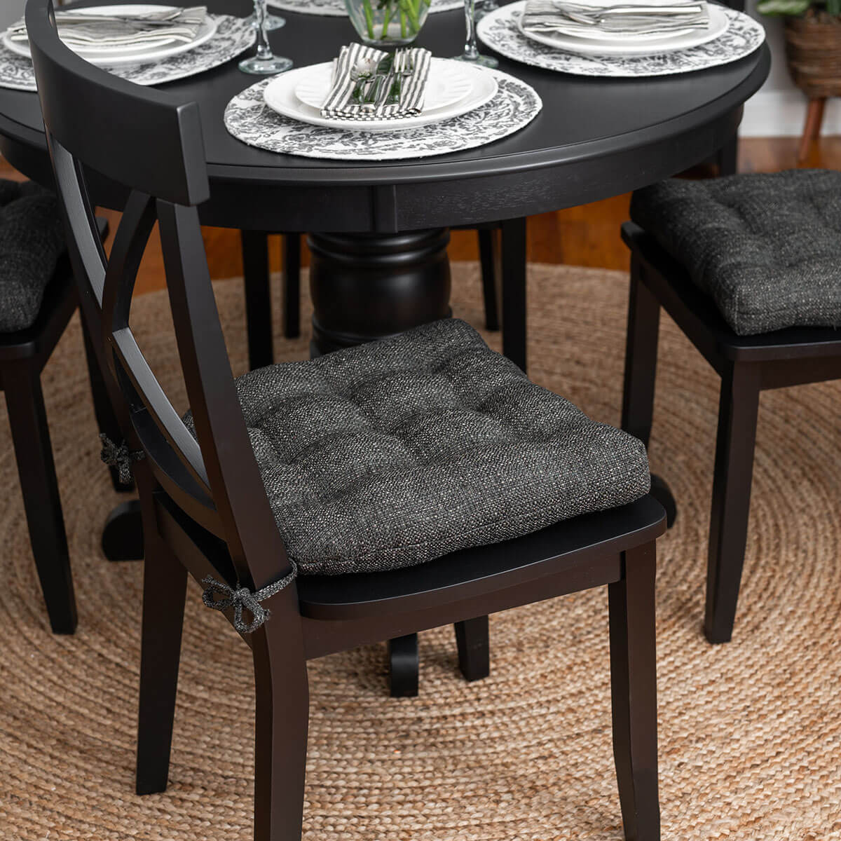 black tweed dining room chair cushions in formal dining room